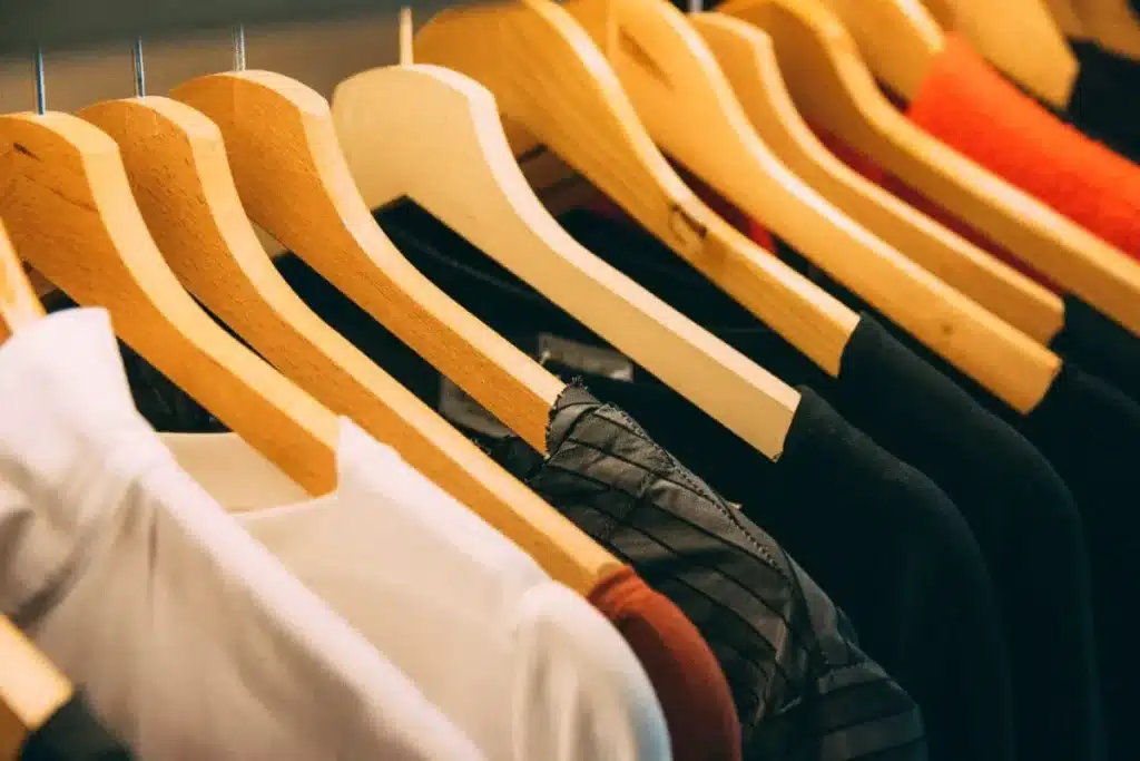 T-shirts hanging on a wardrobe
