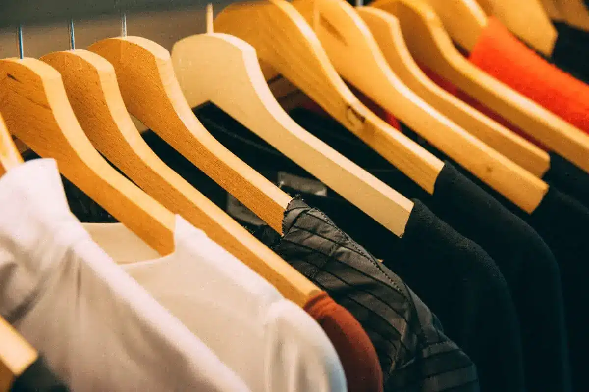 T-shirts hanging on a wardrobe